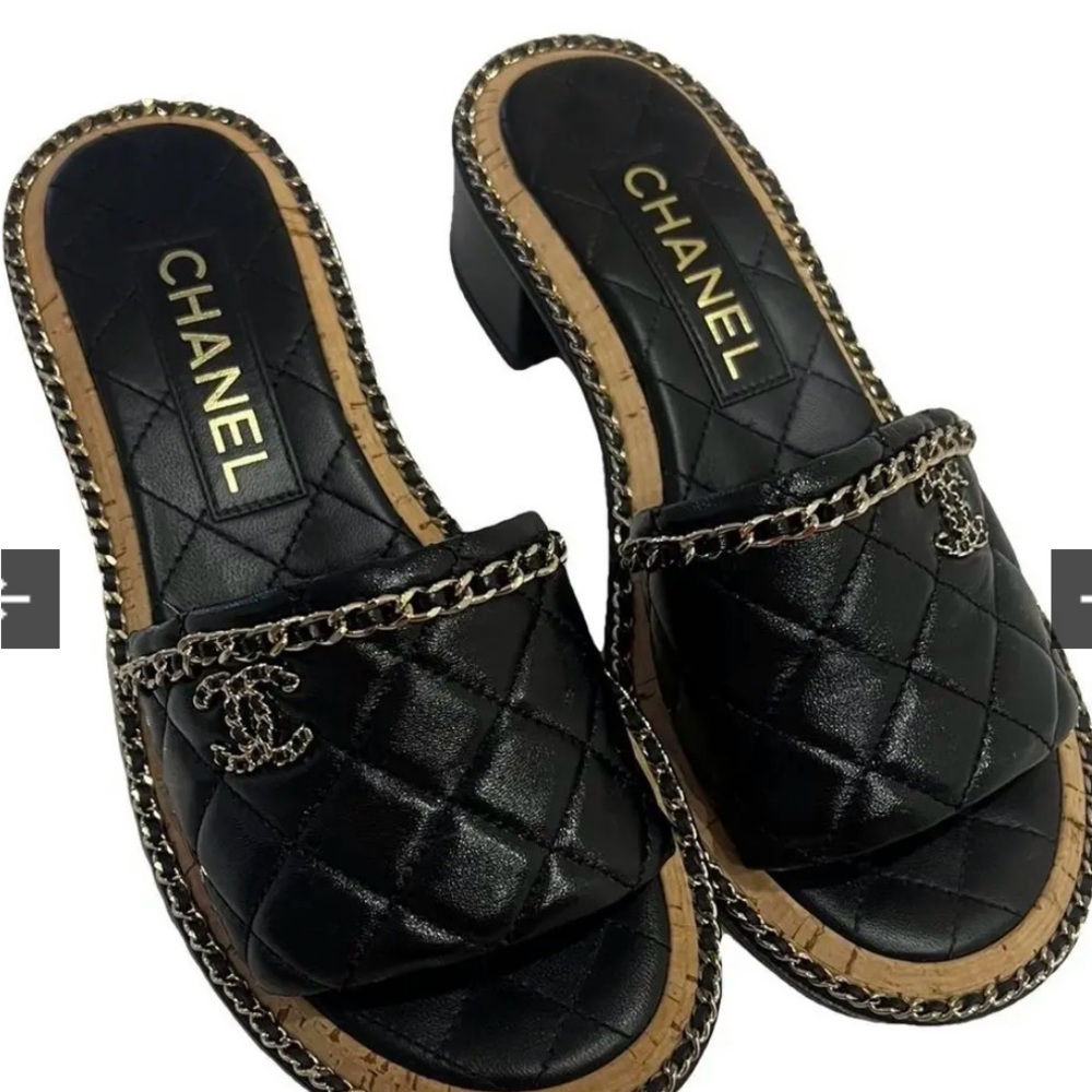 CHANEL Black Quilted Mules with Chain Accent
